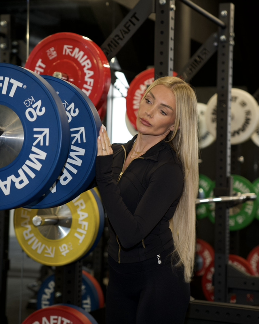 Loading a barbell in the studio